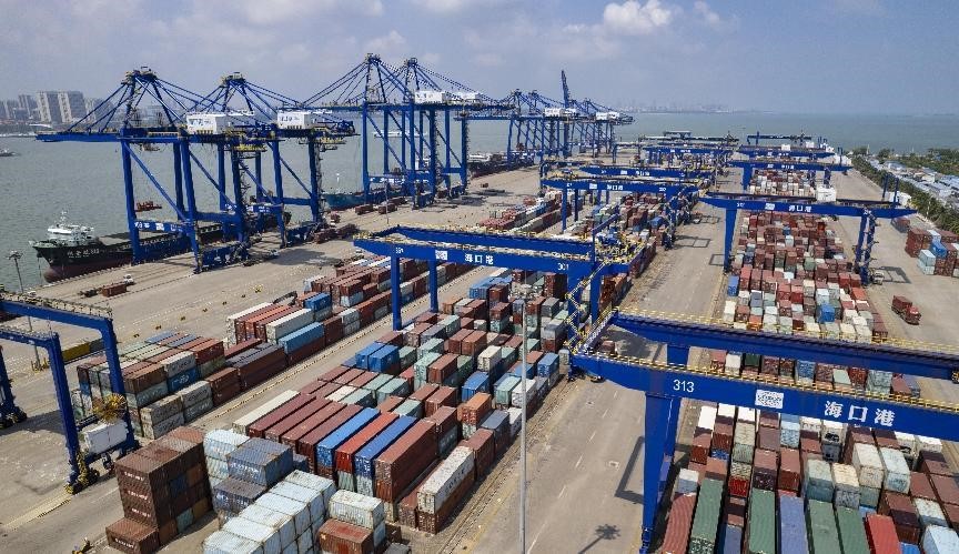 Container cranes and cargo at Haikou Port in Hainan